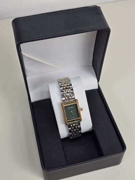 ساعه Cartier  مكس ذهبي ارضيه زيتي