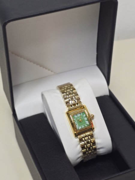 ساعة Cartier ذهبي ارضية خضراء