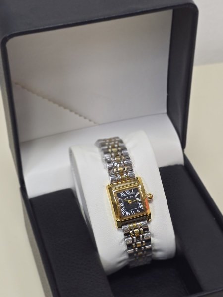 ساعة Cartier مكس ذهبي ارضية سوداء